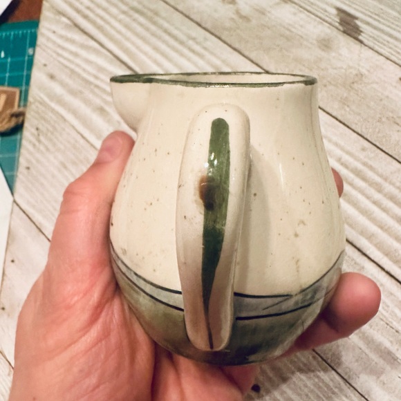 Handcrafted Ceramic Pitcher with Artistic Design - Picture 4 of 7